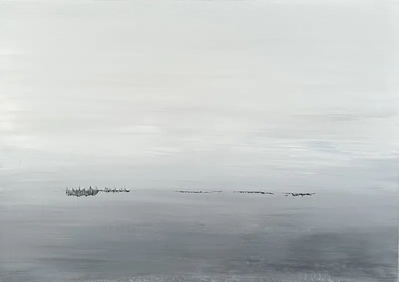 A grey horizon, a few boats far away